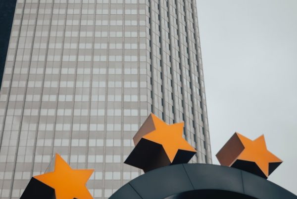 Sign of european union in front of skyscraper
